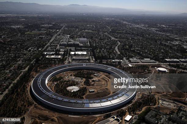 An aerial view of the new Apple headquarters on April 28, 2017 in Cupertino, California. Apple's new 175-acre 'spaceship' campus dubbed "Apple Park"...