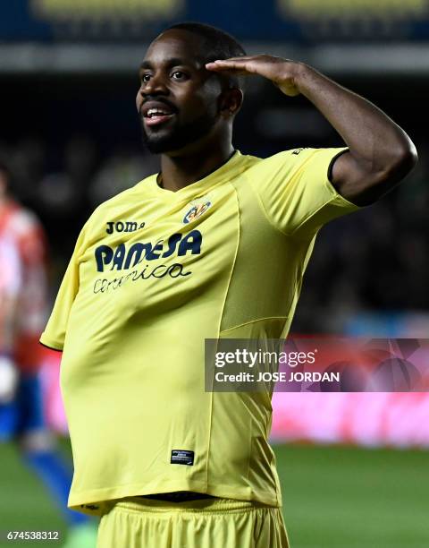 Villarreal's Congolese forward Cedric Bakambu celebrates a goal during the Spanish league football match Villarreal CF vs Real Sporting de Gijon at...