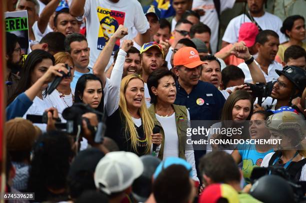 Jailed opposition leader Leopoldo Lopez's wife Lilian Tintori and mother Antonieta Mendoza de Lopez and other activists are stopped by the National...