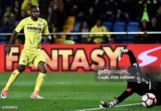 Villarreal's Congolese forward Cedric Bakambu scores a goal during the Spanish league football match Villarreal CF vs Real Sporting de Gijon at La...