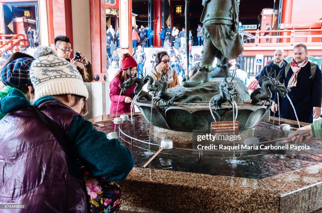 People around fountain in Sensoji temple...