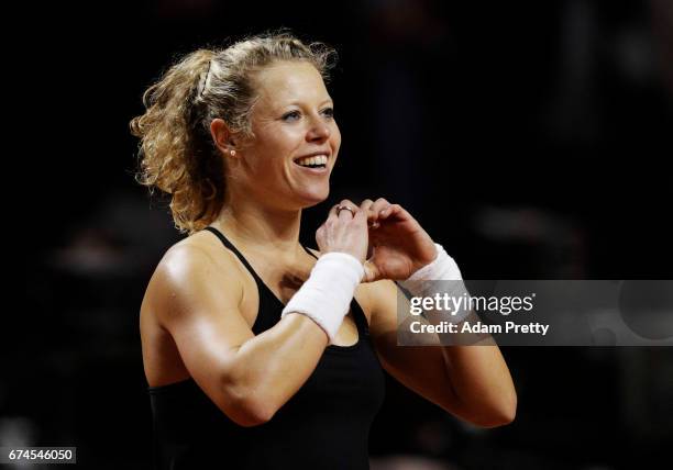 Laura Siegemund of Germany celebrates winniong match point during her match against Karolina Pliskova of the Czech Republic during the Porsche Tennis...