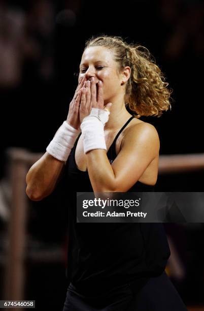 Laura Siegemund of Germany celebrates winniong match point during her match against Karolina Pliskova of the Czech Republic during the Porsche Tennis...