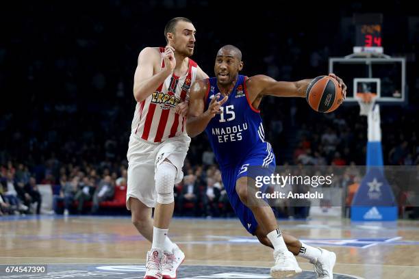 Jayson Granger of Anadolu Efes in action against Nikola Milutinov of Olympiacos Piraeus during the Turkish Airlines Euroleague Playoffs Game 4th...