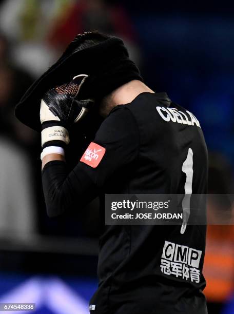 Sporting Gijon's goalkeeper Ivan Cuellar gestures at the end of the Spanish league football match Villarreal CF vs Real Sporting de Gijon at La...