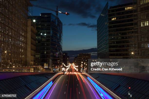 Traffic makes its way through central Brussels past the European Union Commission headquarters on April 28, 2017 in Brussels, Belgium. The 27 members...