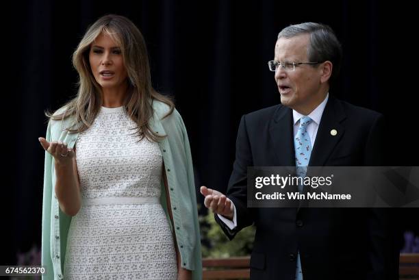 First lady Melania Trump takes part in a "Blessing of the Garden" with Michael Williams , chairman of the board, at the Children's National Health...