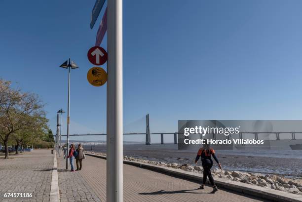 Modern sign gives directions to guide pilgrims who walk the 'Camino do Tejo' , a 139 km trail, from Lisbon to Fatima Sanctuary on April 27, 2017 in...