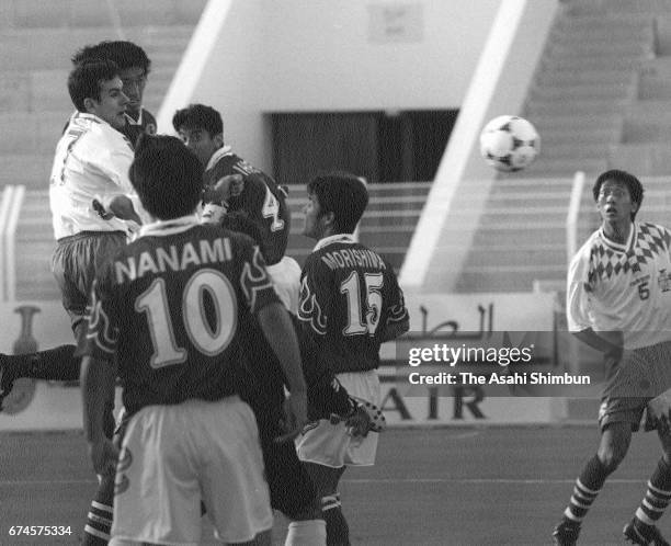 Takuya Takagi of Japan heads the ball to score the opening goal during the FIFA World Cup Asian Qualifier first round Group 4 match between Oman and...