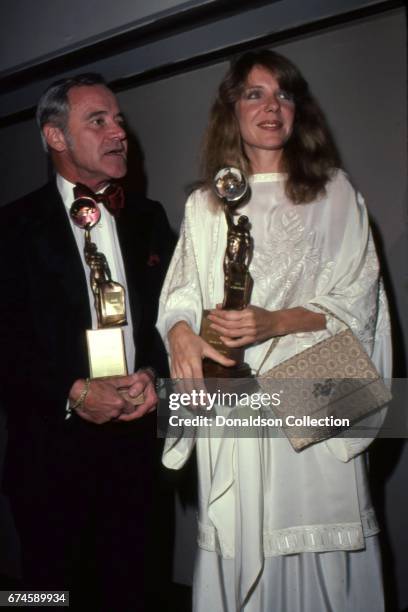 Actors Jack Lemmon and Jill Clayburgh hold their awards as they attend the NATO awards at the Bonaventure Hotel in November 1979 in Los Angeles,...