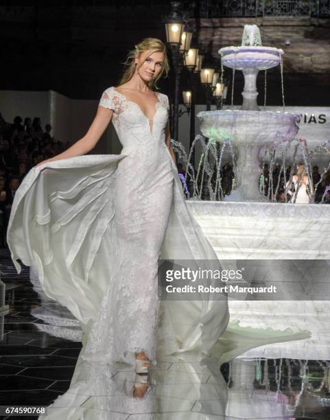 Model walks the runway for the Pronovias Show during Barcelona Bridal Fashion Week 2017 held at the Museu Nacional d'Art de Catalunya on April 28,...