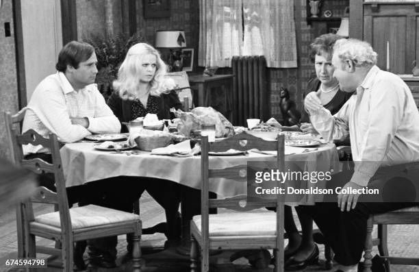 Rob Reiner, Sally Struthers, Carroll O'Connor and Jean Stapleton acting on the set of "All in the Family" TV show in 1978 in Los Angeles, California.