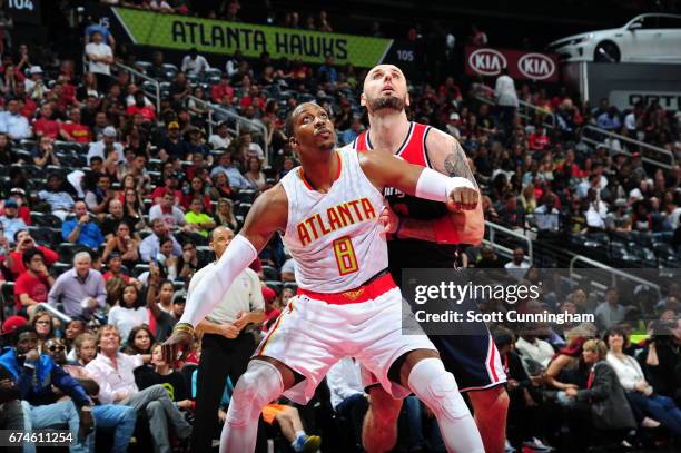 Dwight Howard of the Atlanta Hawks boxes out Marcin Gortat of the Washington Wizards during Game Six of the Eastern Conference Quarterfinals of the...