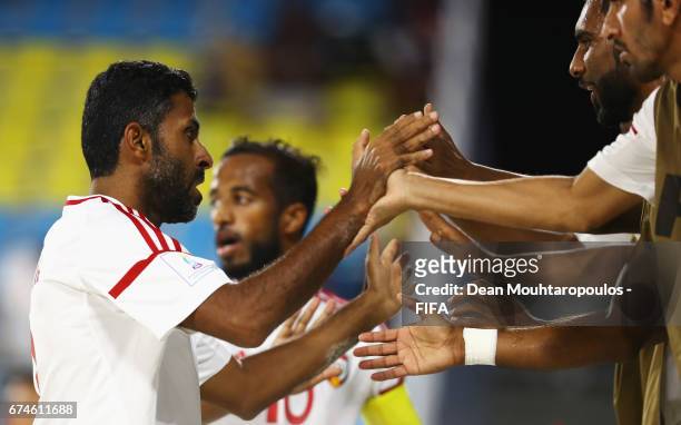 Haitham Mohamed of United Arab Emirates celebrates scoring a goal with team mates during the FIFA Beach Soccer World Cup Bahamas 2017 group C match...