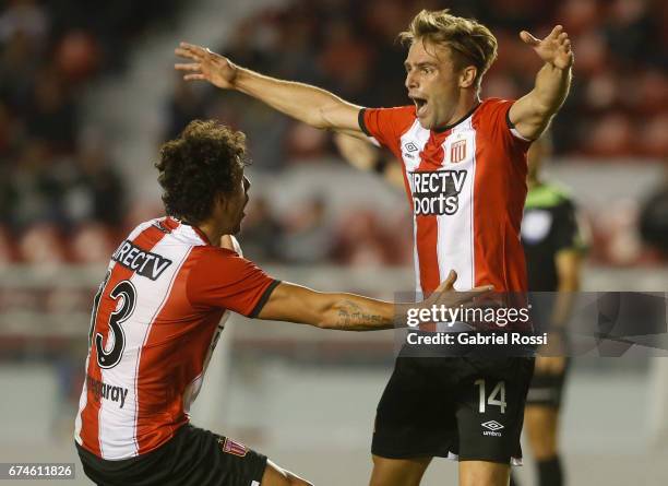 Facundo Sanchez of Estudiantes celebrates with teammate Matias Aguirregaray after scoring the first goal of his team during a match between...