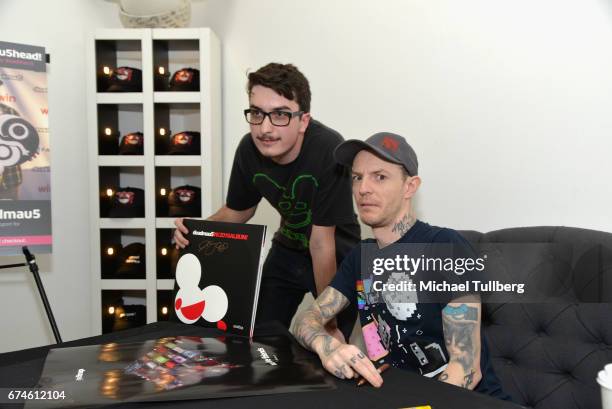 Electronic musician deadmau5 poses with a fan at deadmau5 and FANCY.com's pop-up shop "Lots Of Stuff In A Store" on April 28, 2017 in Los Angeles,...