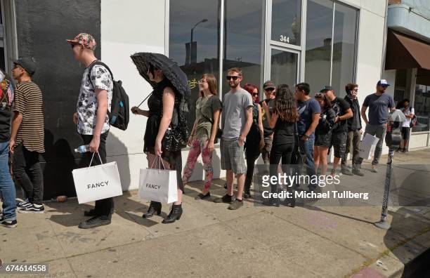 Fans wait in line outside at electronic musician deadmau5 and FANCY.com's pop-up shop "Lots Of Stuff In A Store" on April 28, 2017 in Los Angeles,...