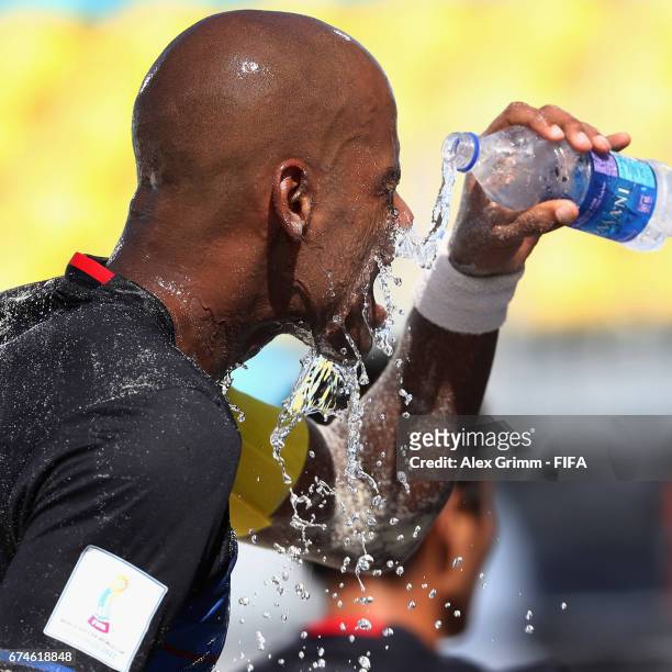 Ozu Moreira of Japan refreshes during the FIFA Beach Soccer World Cup Bahamas 2017 group D match between Japan and Poland at National Beach Soccer...
