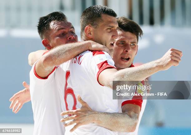 Jakub Jesionowski of Poland celebrates a goal during the FIFA Beach Soccer World Cup Bahamas 2017 group D match between Japan and Poland at National...