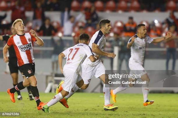 Ezequiel Barco of Independiente celebrates with teammates after scoring the second goal of his team during a match between Independiente and...