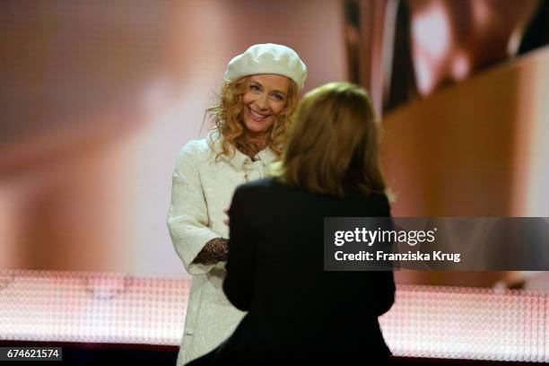 Katja Rieman congratulates Maren Ade for winning the Award for Best Director for her film Toni Erdmann at the Lola - German Film Award show at Messe...