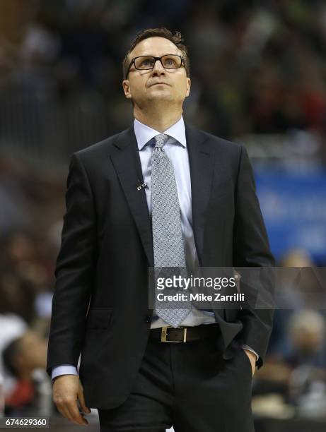 Washington Wizards head coach Scott Brooks watches the scoreboard during Game Six of the Eastern Conference Quarterfinals against the Atlanta Hawks...