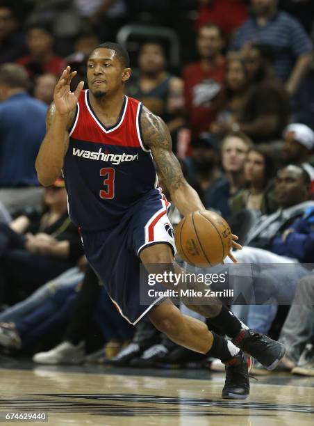 Guard Brandon Beal of the Washington Wizards dribbles during Game Six of the Eastern Conference Quarterfinals against the Atlanta Hawks at Philips...