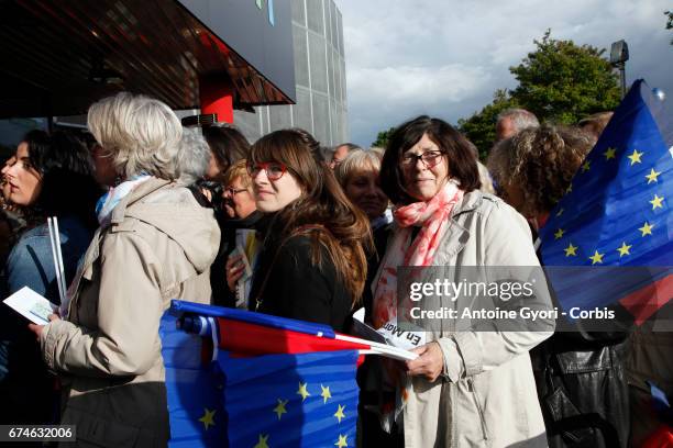 People attend the rally of president of the political movement 'En Marche !' and french presidential election candidate Emmanuel Macron on April 26,...