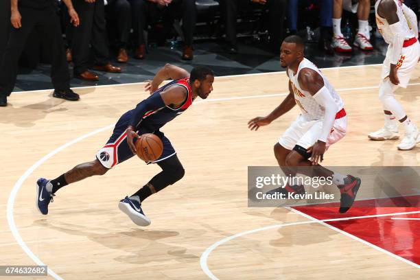 John Wall of the Washington Wizards drives to the basket against the Atlanta Hawks in Game Six of the Eastern Conference Quarterfinals of the 2017...