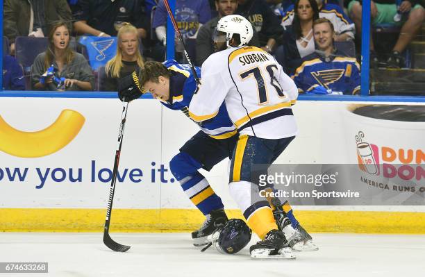 St. Louis Blues center Jori Lehtera battles for the puck with np76\ during game 1 of the second round of the 2017 Stanley Cup Playoffs between the...