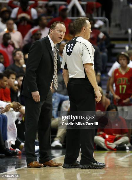 Atlanta Hawks head coach Mike Budenholzer argues with referee Bill Spooner during Game Six of the Eastern Conference Quarterfinals against the...