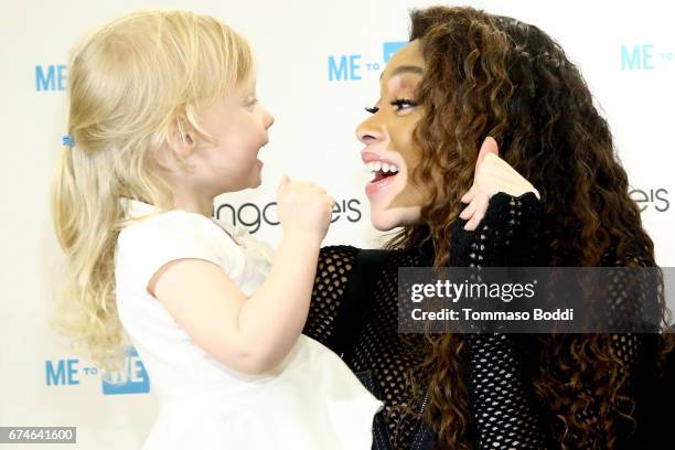 Winnie Harlow and guest attend The ME To WE Semiprecious Launch At Bloomingdale's Sherman Oaks at Westfield Fashion Square on April 28, 2017 in...