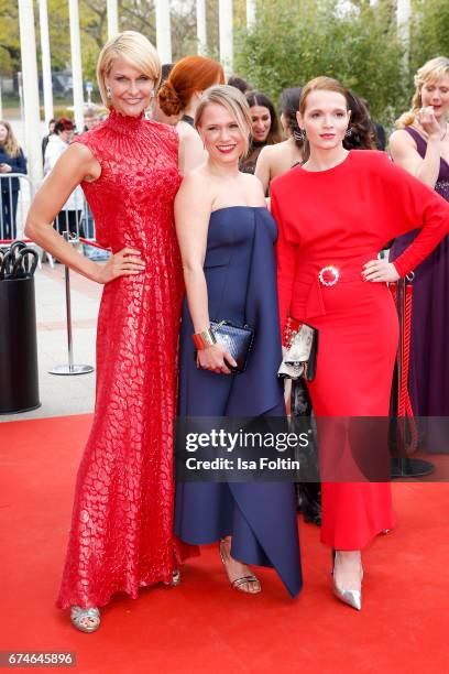 Natascha Gruen, german presenter Nova Meierhenrich and german actress Karoline Herfurth during the Lola - German Film Award red carpet arrivals at...