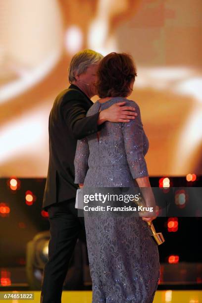 Film Director Andreas Dresen and Monika Schindler walk off stage at the Lola - German Film Award show at Messe Berlin on April 28, 2017 in Berlin,...