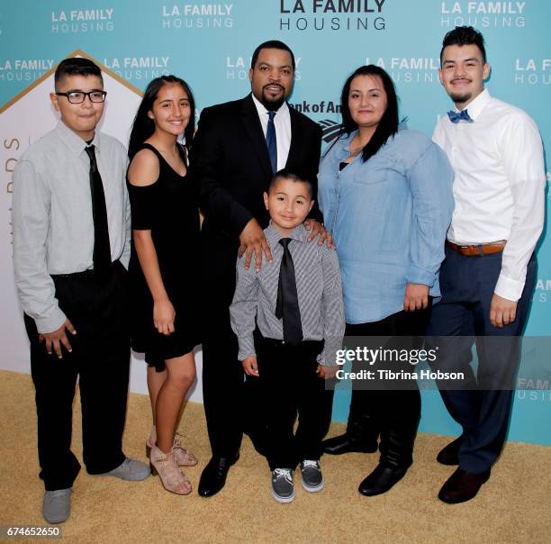 Ice Cube and a family from LA Family Housing attend the LA Family Housing 2017 Awards at The Lot on April 27, 2017 in West Hollywood, California.