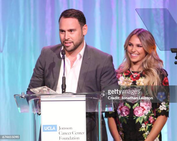 The Gil Nickel Humanitarian Award recipients Scooter and Yael Braun speak onstage at the UCLA Jonsson Cancer Center Foundation Hosts 22nd Annual...