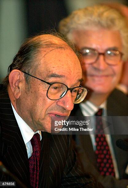 Chairman of the Federal Reserve Board Alan Greenspan gives a keynote address to the Euro 50 Group Roundtable as Edmond Alphandery , chairman of the...