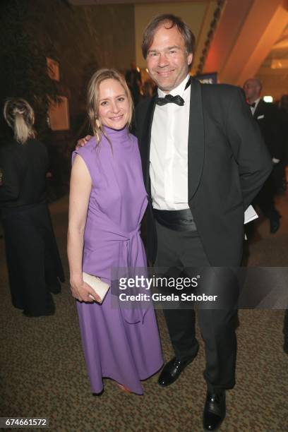 Julia Jentsch and her husband Christian Habluetzel barefoot during the Lola - German Film Award after party at Palais am Funkturm on April 28, 2017...