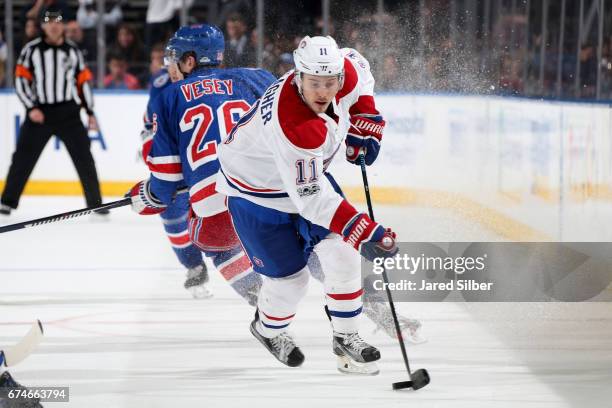 Brendan Gallagher of the Montreal Canadiens skates with the puck against the New York Rangers in Game Six of the Eastern Conference First Round...