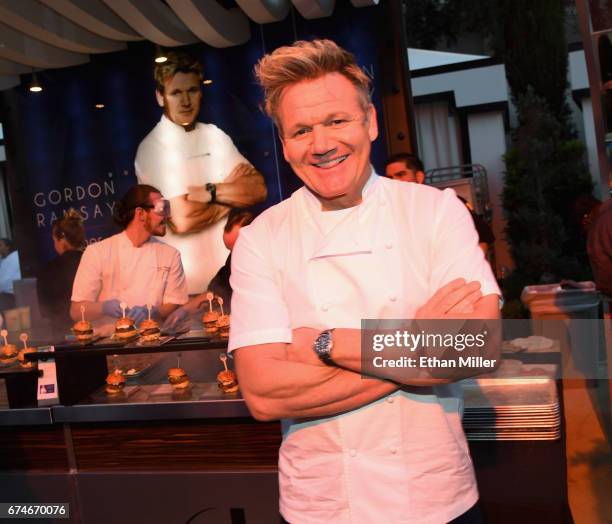Television personality and chef Gordon Ramsay poses at the Gordon Ramsay Burger booth at the 11th annual Vegas Uncork'd by Bon Appetit Grand Tasting...