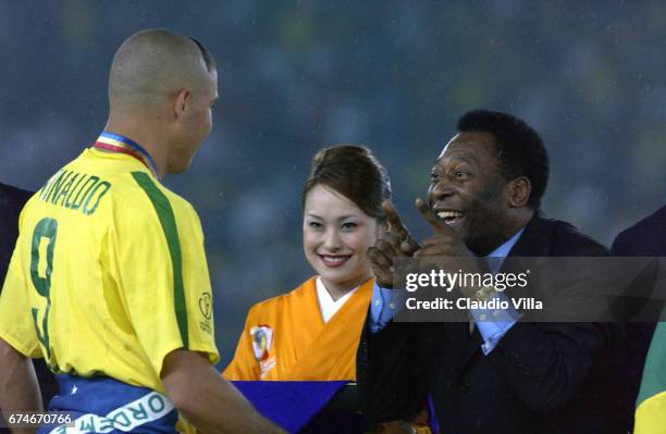 June 2002: Brazilian soccer legend Pele hugs forward Ronaldo after Brazil defeated Germany 2-0 in the final match of the 2002 FIFA World Cup Korea...