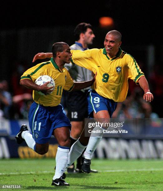 Ronaldo and Romario of Brazil celebrate during the match in the Tournoi De France in Lyon, France.