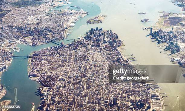 manhattan island and brooklyn from the air - great american group stock pictures, royalty-free photos & images