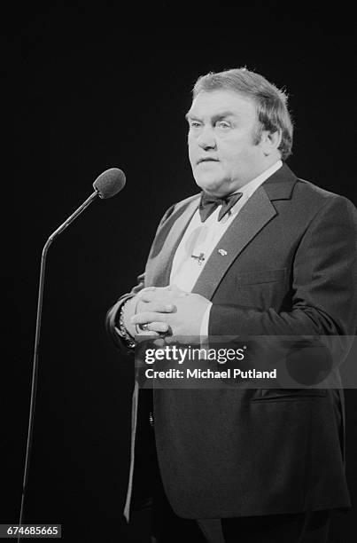 English comedian Les Dawson performing at the Royal Variety Performance, Theatre Royal, Drury Lane, London, 7th November 1983.