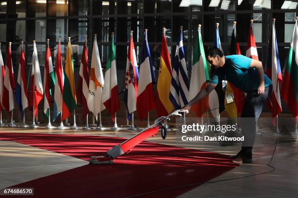 The red carpet is swept at the Council of the European Union ahead of an EU Council meeting on April 29, 2017 in Brussels, Belgium. The 27 members of...