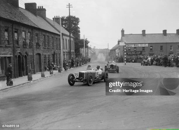 Edgar Maclure's Riley leading Tim Birkin's Alfa Romeo, RAC TT Race, Ards Circuit, Belfast, 1932. Artist: Bill Brunell.