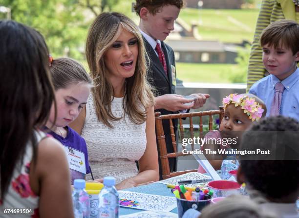 First Lady Melania Trump visits with children at a ribbon cutting ceremony at Children's National Health System on April 2017 in Washington, DC.