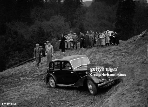 Riley of F Broomfield competing in the MCC Edinburgh Trial, Roxburghshire, Scotland, 1938. Artist: Bill Brunell.