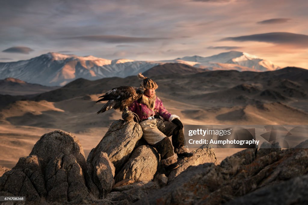 Young woman eagle hunting from the Altai moutains, Mongolia