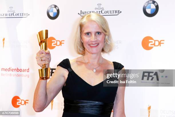 Award winner for best cut in 'Toni Erdmann' Heike Parplies at the Lola - German Film Award winners board at Messe Berlin on April 28, 2017 in Berlin,...